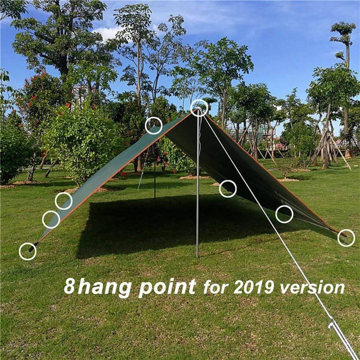 Portable outdoor waterproof camping tarp set up as a sun shelter for picnics & hiking.