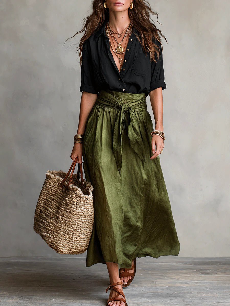 Green women's relaxed two-piece set featuring a button-front blouse and a flowy maxi skirt. Perfect for summer.