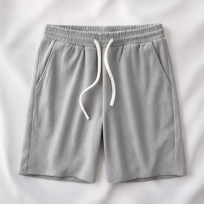 Black unisex relaxed comfort drawstring shorts, essential for casual wear, loungewear, or active summer days.