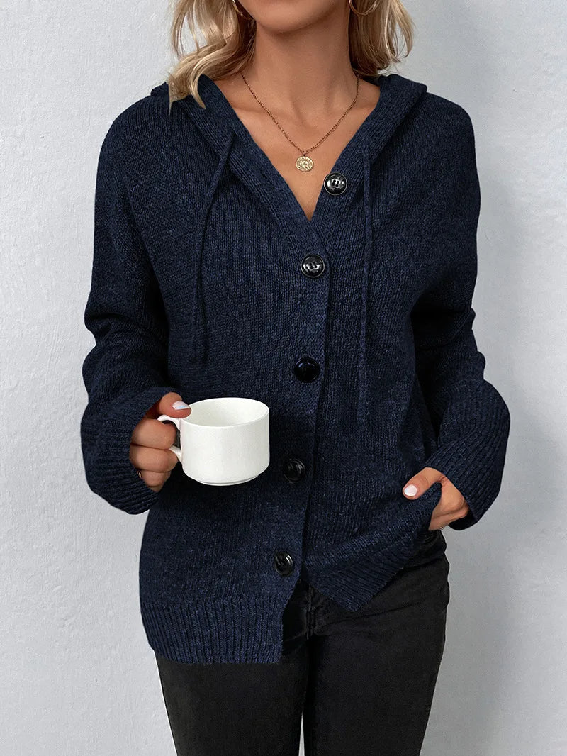 Close-up: beige women's soft knit cardigan hoodie, casual weekend style emphasized.