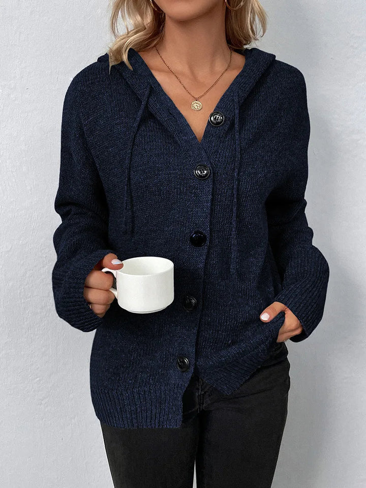 Close-up: beige women's soft knit cardigan hoodie, casual weekend style emphasized.