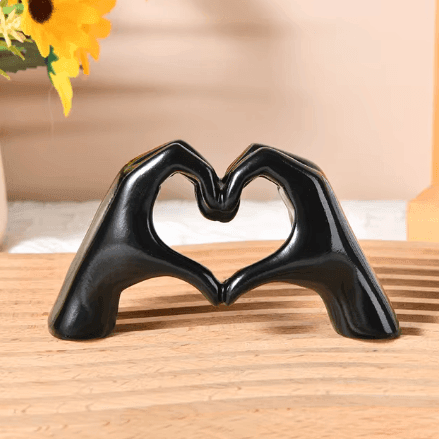 Unique handcrafted wood heart hands sculpture, a beautiful love symbol and rustic home decor gift.
