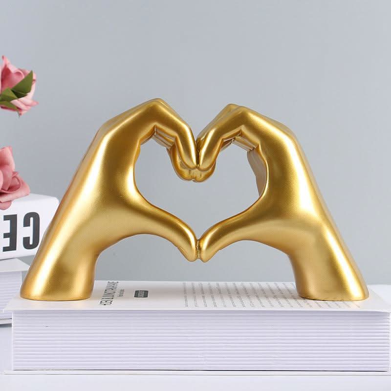 Exquisite handcrafted wood heart hands sculpture, bringing rustic charm & love symbol warmth to any home decor.