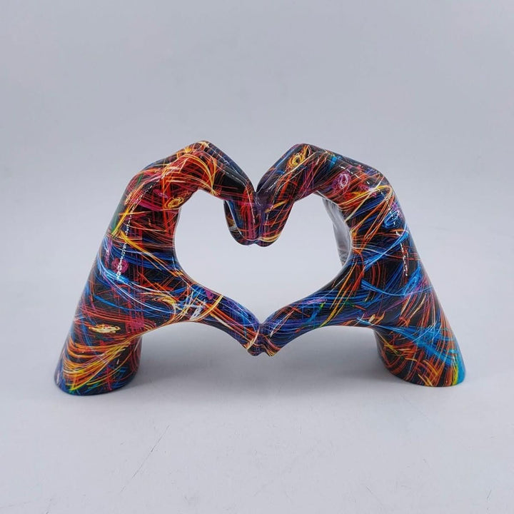 Rustic wooden heart hands sculpture, perfect table decor for a warm, handcrafted home accent & love symbol.