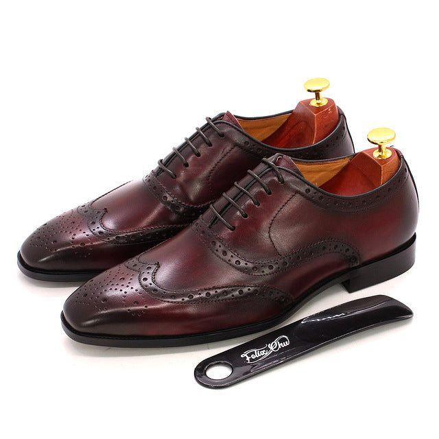 Classic men's handcrafted wingtip Oxford shoes, a timeless and elegant choice for discerning gentlemen.