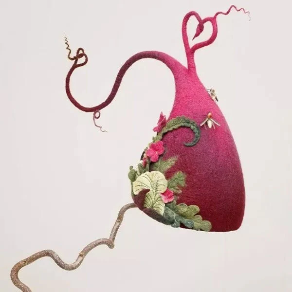 Unisex adult handmade felt witch hat. Black merino wool Halloween costume accessory, ideal for parties & cosplay.