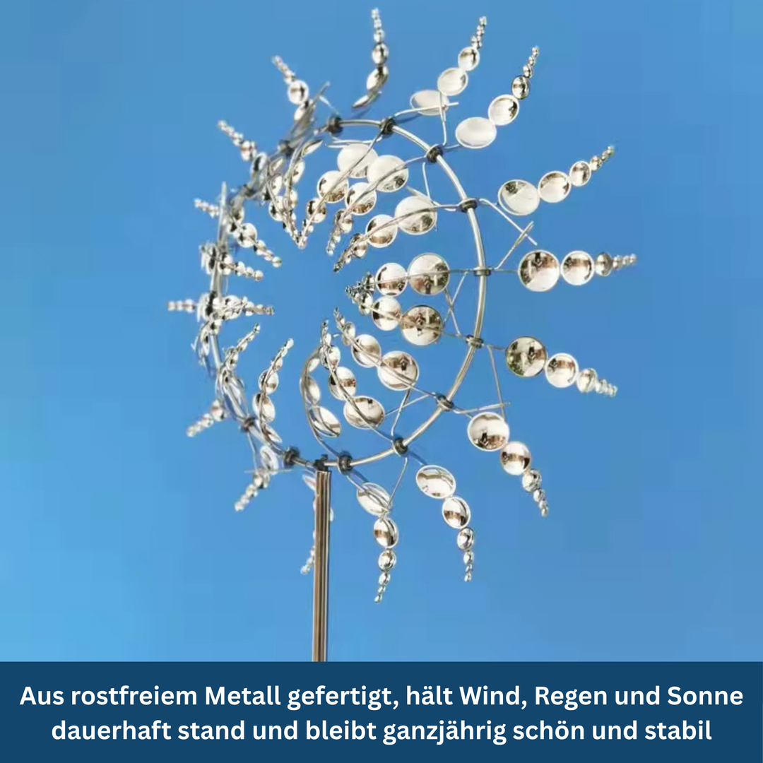 Decorative garden windmill, red and white blades spinning, outdoor lawn ornament
