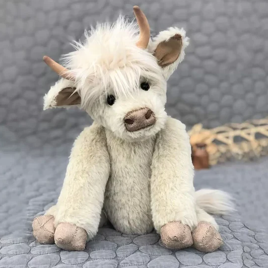 Handmade Scottish Highland cow plush toy. Soft alpaca fur stuffed animal, perfect for kids & collectors.