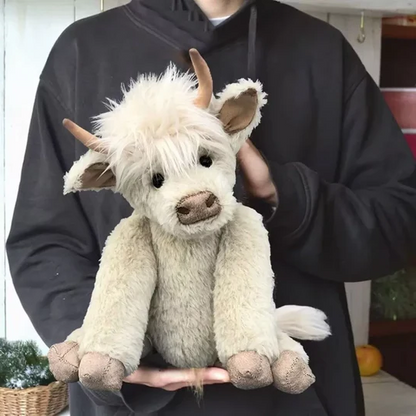 Authentic Scottish Highland cow soft toy, handmade from luxurious alpaca fur. A lovable plush farm animal.
