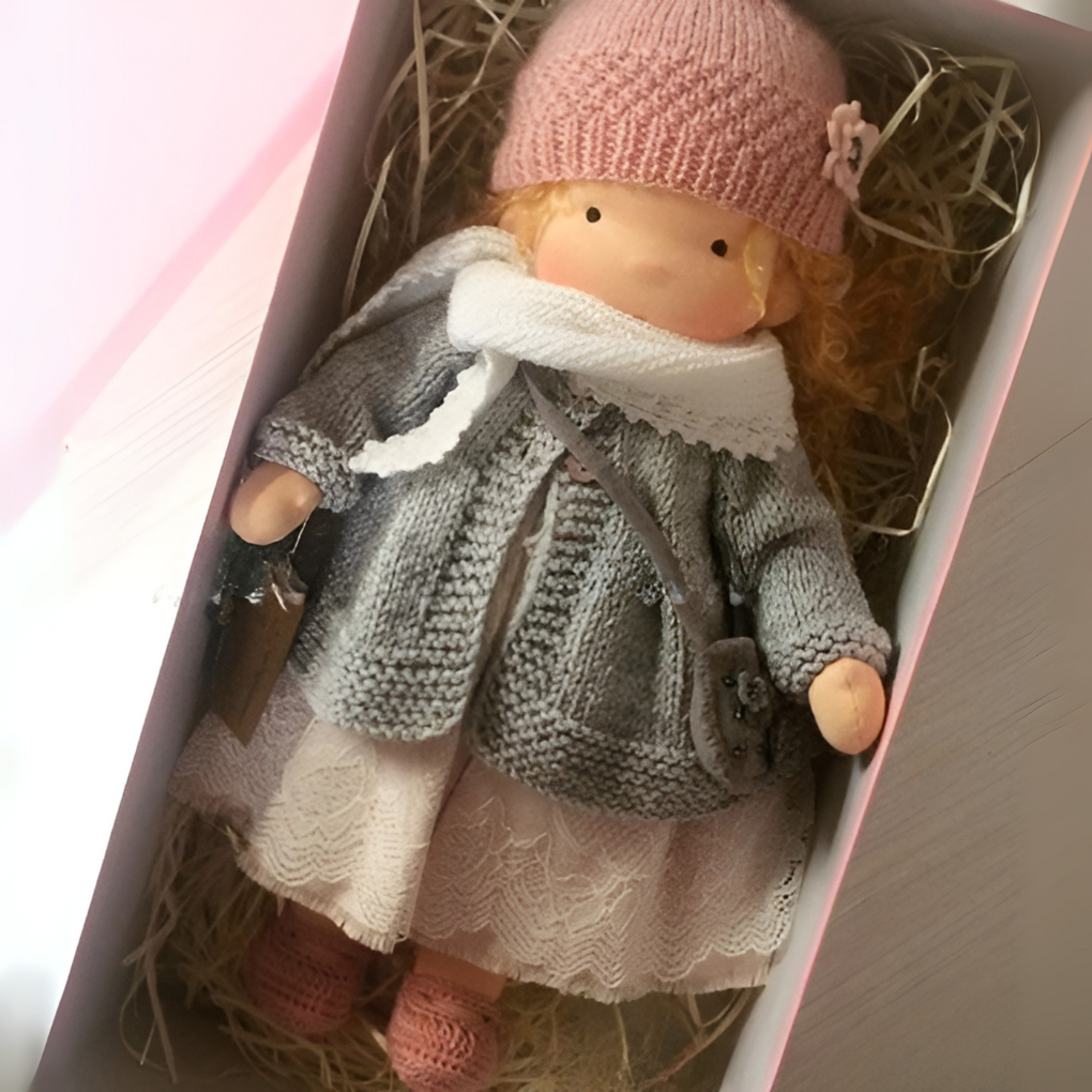 Gift for kids: handmade Waldorf cloth doll, ideal for imaginative play.
