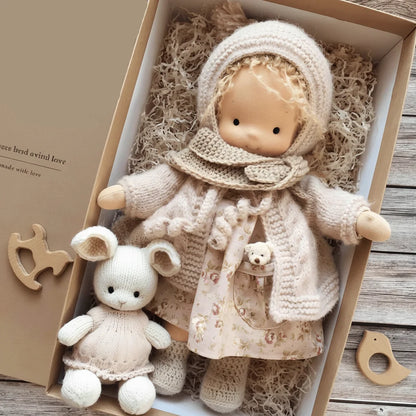 Handmade Waldorf doll, soft cotton, natural kids toy for imaginative play & nurturing. Perfect toddler gift.