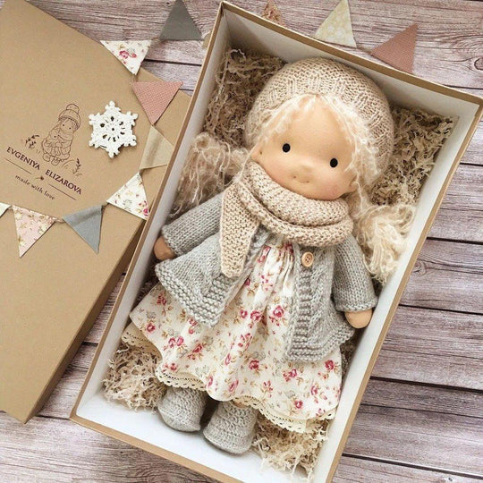 Sweet Waldorf doll with gentle features, made from natural cotton, a durable & soft handmade toy for kids' comfort.