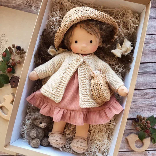 Unique handmade Waldorf doll, natural cotton & eco-friendly materials, a timeless soft toy for children's imaginative play.