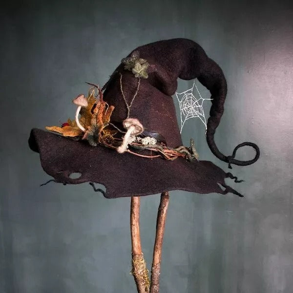 Spooky handmade black felt witch hat for women's Halloween party. Merino wool costume accessory.