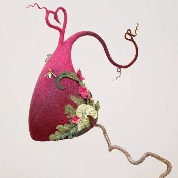 Elegant handmade felt witch hat, perfect for women's Halloween cosplay. Adjustable merino wool adult accessory.