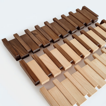 Stylish handmade wooden coat rack with convenient folding hooks, perfect for modern home decor.