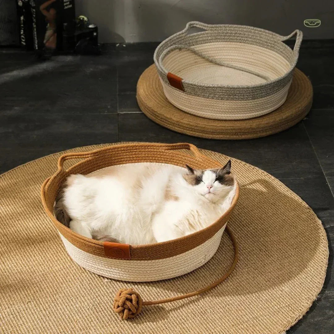 Handwoven cotton rope cat bed, a cozy pet lounge for feline comfort. Perfect pet furniture.