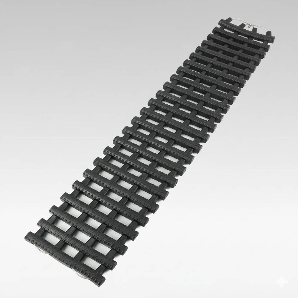 Heavy-duty car traction mat for off-road recovery, enhancing tire grip in snow, sand, or mud.