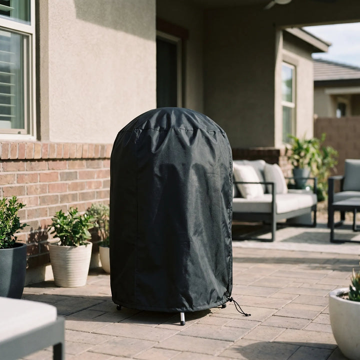 Heavy-duty round outdoor grill cover, perfect for kettle grills. Provides all-weather protection for your backyard BBQ.