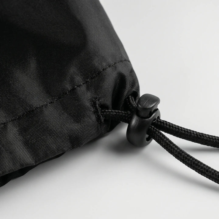 Round kettle grill cover, ideal for outdoor cooking protection. Keep your barbecue safe from weather in the backyard.