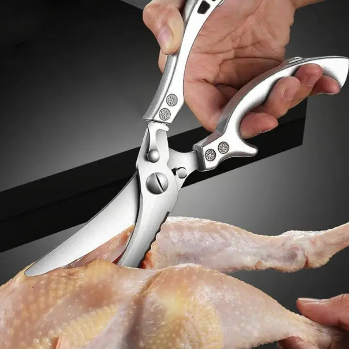 Heavy-duty stainless steel kitchen shears for effortless cutting of various foods.