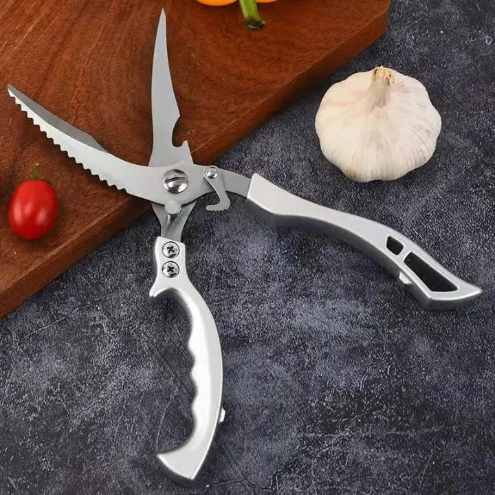 Versatile stainless steel kitchen shears, heavy-duty, sharp, for poultry, meat, & fish scaling.