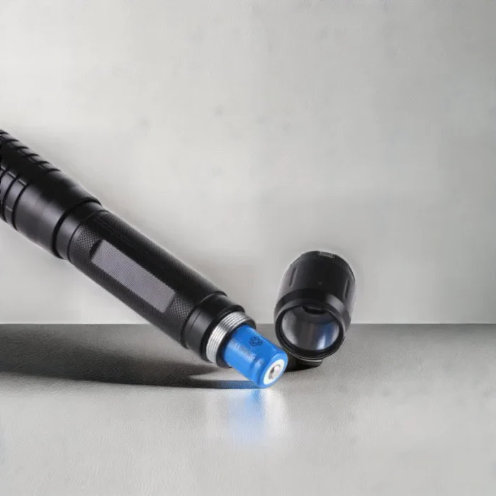 Durable military-grade blue laser flashlight, ideal survival tool for emergency, camping, and hiking.
