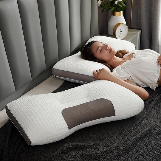 Hybrid pillow for back & side sleepers, offering ergonomic neck & shoulder support for pain relief & comfort.