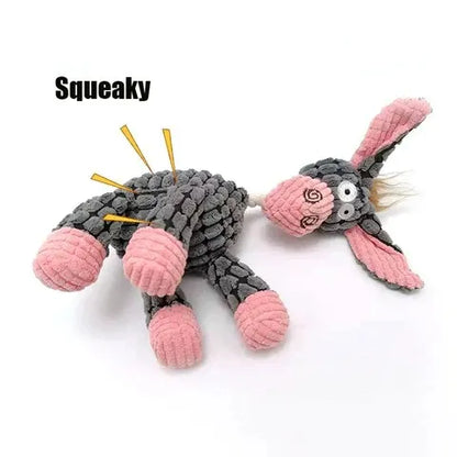 Interactive indestructible dog plush toy for heavy chewers. Promotes anxiety relief & healthy play, with squeaker.