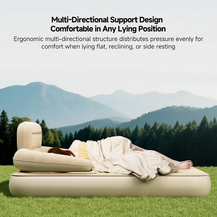 Durable inflatable bed with headrest for camping, offering plush comfort and easy portability.