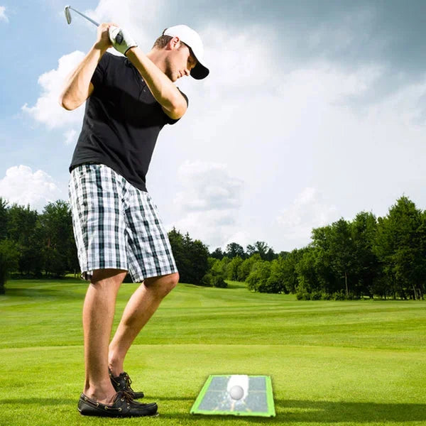 Divot mat golf aid for swing detection, helping golfers perfect their technique & improve accuracy.