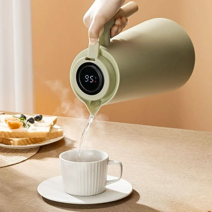 Modern stainless steel thermos flask with a digital temp display & ergonomic wooden handle.