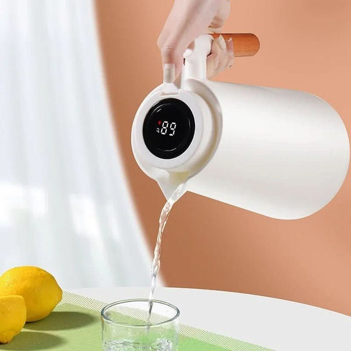 High-quality insulated pitcher for hot or cold drinks, with digital temp and wood handle.
