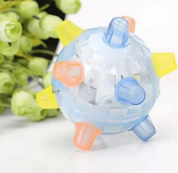 Dog excitedly playing with an interactive jumping ball toy, promoting active exercise & fun.