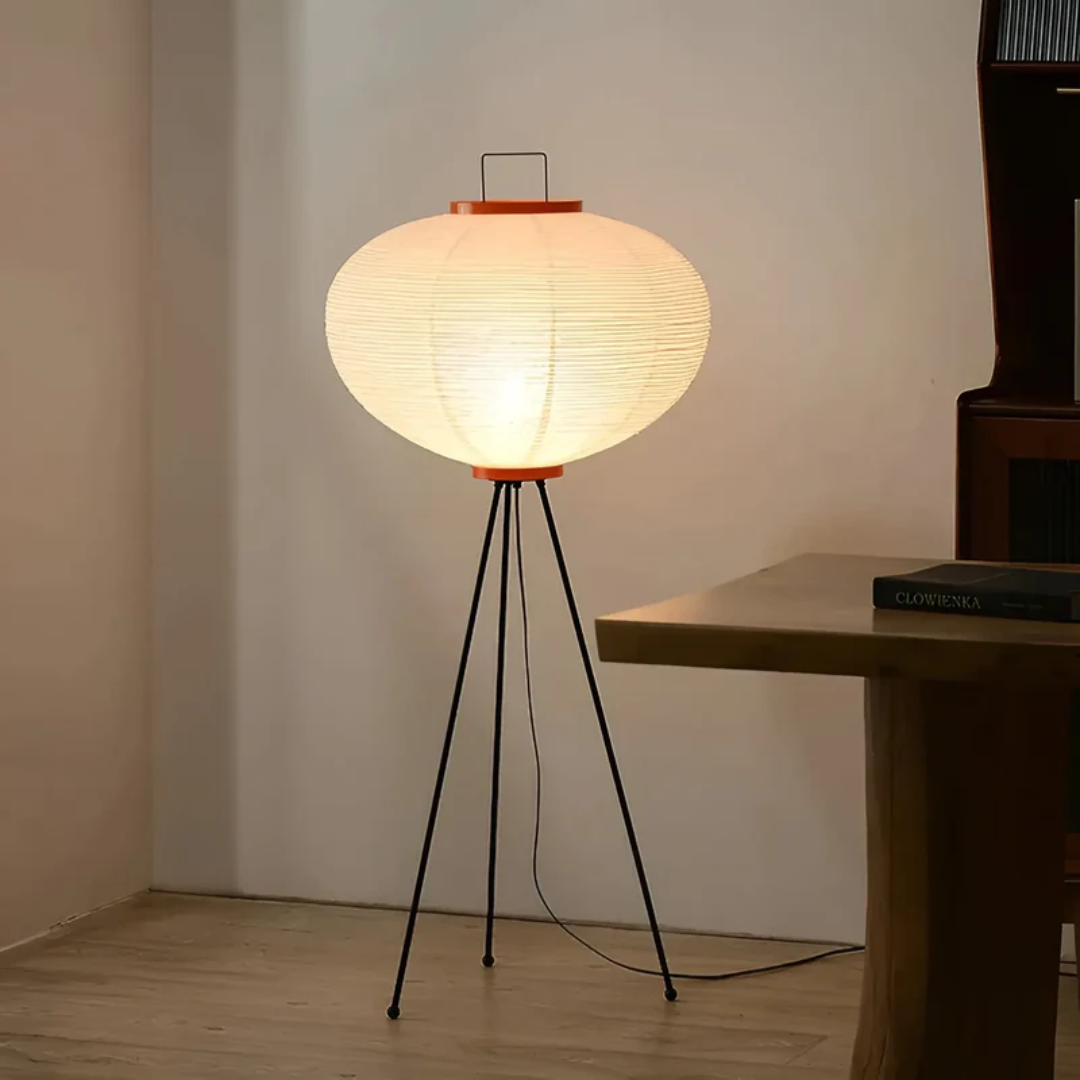 ZenAura Wabi-Sabi rice paper standing LED floor lamp creating a calming ambiance in a modern living room.