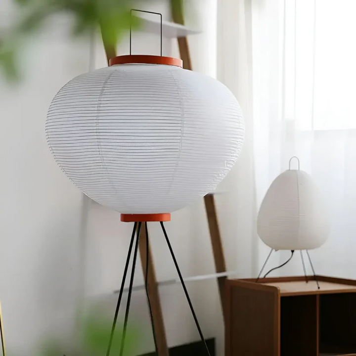 Soft glow from a Wabi-Sabi rice paper LED floor lamp, perfect for tranquil ambiance and Zen home decor.