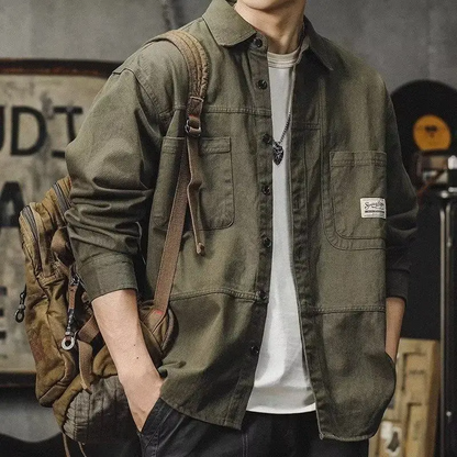 Versatile men's craftsman button-up shirt in khaki. Durable fabric for workwear or casual rugged style.