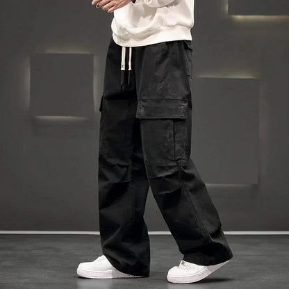 Black men's relaxed fit utility cargo pants, comfortable & versatile with multiple pockets, ideal for outdoor & casual style.