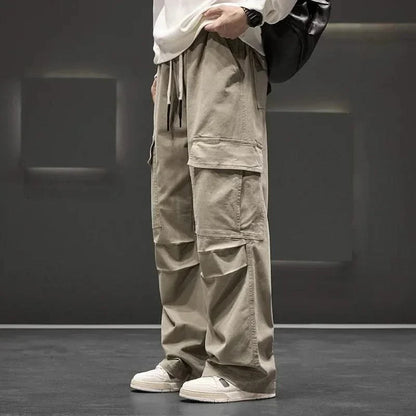 Comfortable men's relaxed fit cargo pants with drawstring waist, ideal for everyday casual wear & versatile outdoor adventures.