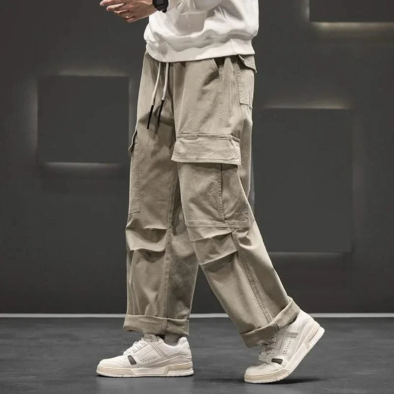Versatile men's relaxed fit utility cargo trousers with multi-pockets, great for casual, outdoor, and everyday comfort.