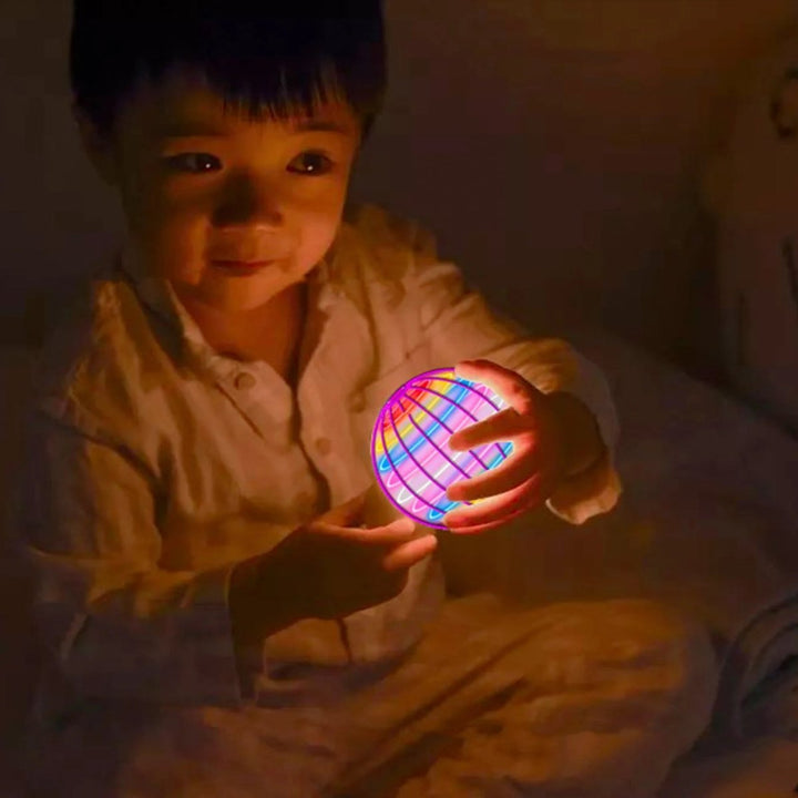Rechargeable flying gyroscope toy for kids, featuring vibrant LED lights and 360° flight.