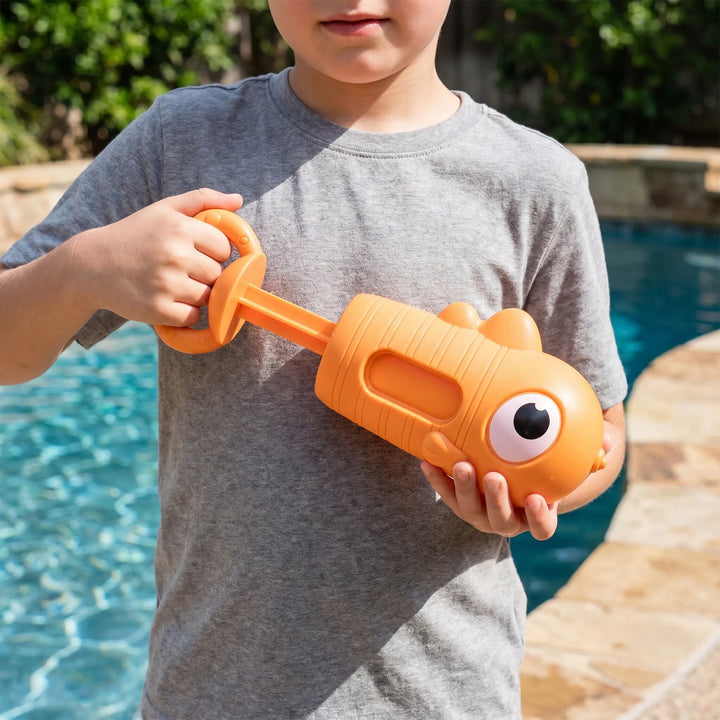 Vibrant manual animal water squirt gun, ideal for toddler fun at the beach or pool.
