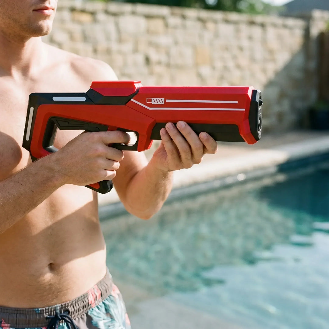 Kids' automatic electric water blaster toy for summer fun. Rechargeable water gun for outdoor play and water fights.