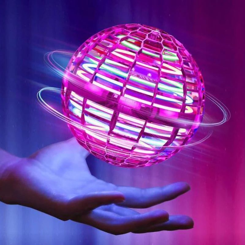Glowing Galaxy Fly Orb in motion, showcasing vibrant LED lights. Fun boomerang flying toy for kids' skill play.