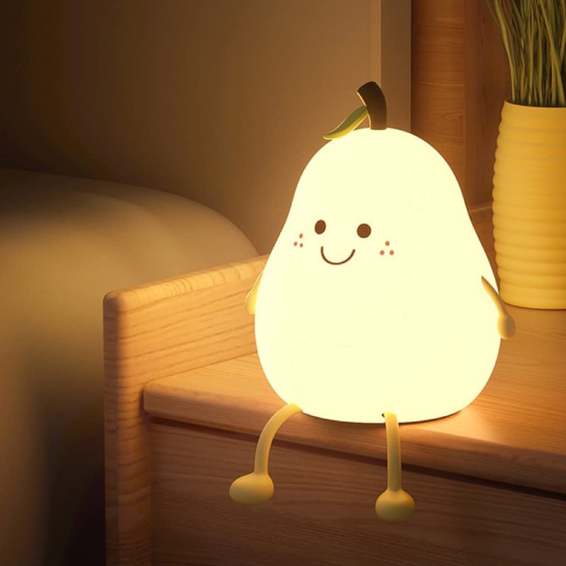 Soft silicone night light for kids, dimmable & gentle glow, a BPA-free sleep aid for peaceful nursery nights.