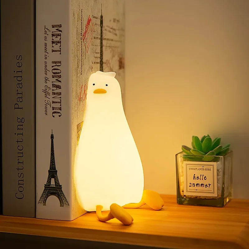 Dimmable animal silicone night light for kids, rechargeable, provides soft glow for nursery sleep aid.