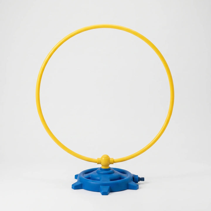 Dynamic rotating water sprinkler, creating a fun water play experience for kids in the garden or backyard.