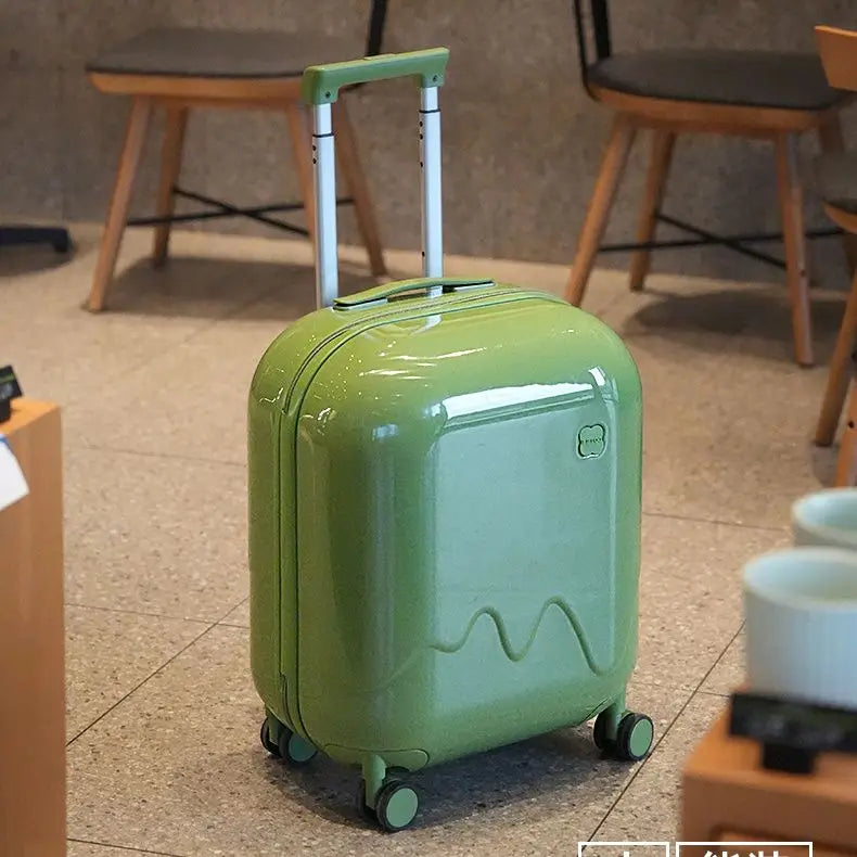 Child's rolling suitcase, lightweight with safety lock. Great for weekend trips & secure luggage.