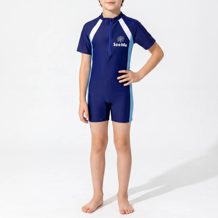 Girls' short-sleeve rash guard, a comfortable one-piece swimsuit for active play and water sports.
