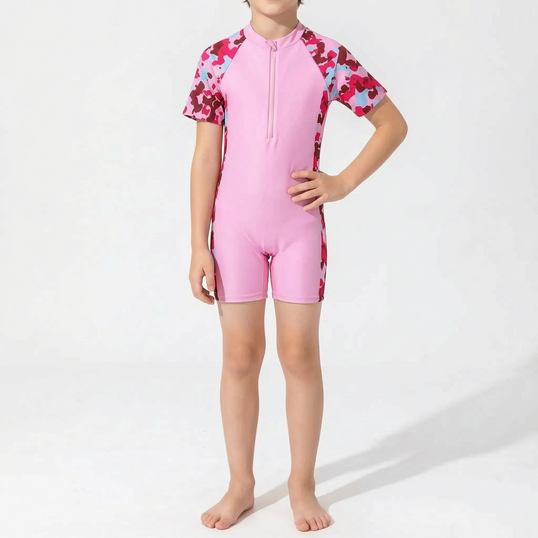 Active youth short-sleeve rash guard for water sports, a one-piece design for comfort and freedom.